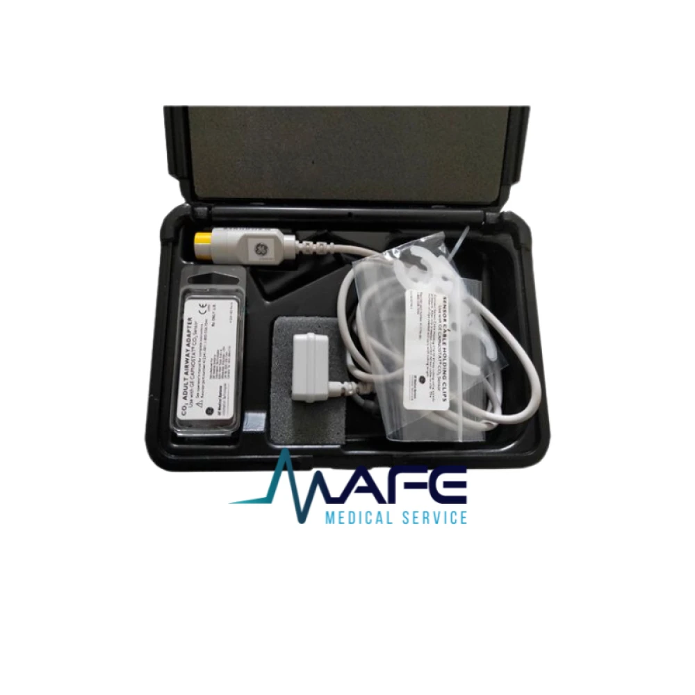 Kit de transductor para capnografía GE Capnostat, incluyendo sensor de CO2, cable y adaptador de vía aérea para monitoreo de pacientes.
